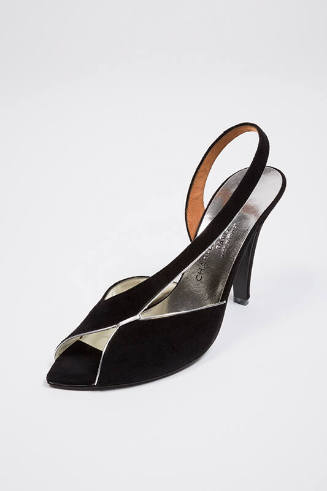 Black open toe slingback pump with silver metallic piping and asymmetric vamp strap