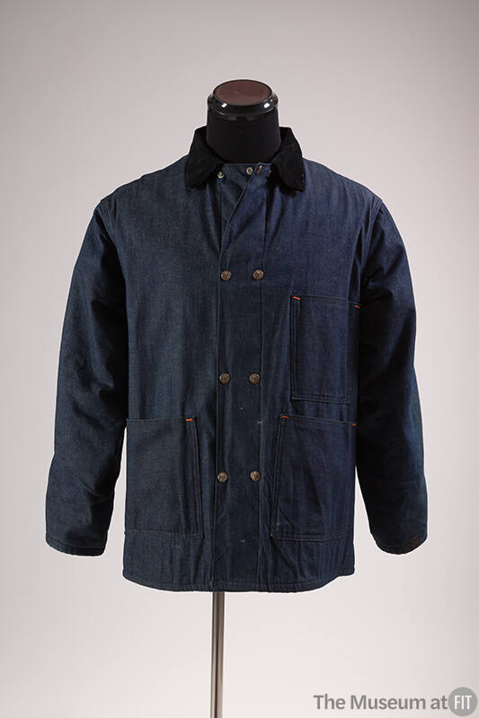 Blue denim snap front jacket with black collar and patch pockets  