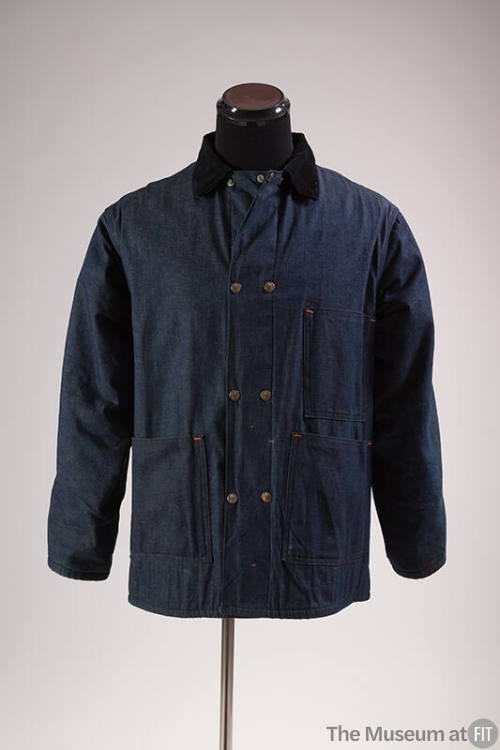 Blue denim snap front jacket with black collar and patch pockets  