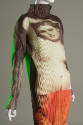 Detail view of column dress bodice showing pleated fabric and photo print of top half of a neoc…