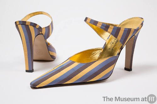 Pair of yellow, brown and violet striped mules with elongated pointed toe, instep strap, high s…