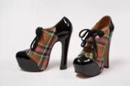 Pair of high heel platform ghillie shoes in red, green, pink and white tartan plaid with black …
