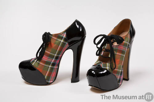 Pair of high heel platform ghillie shoes in red, green, pink and white tartan plaid with black …