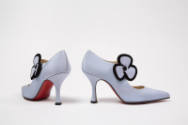 Alternate view of pale purple high heel shoes with large flower at ankle strap lined in black, …