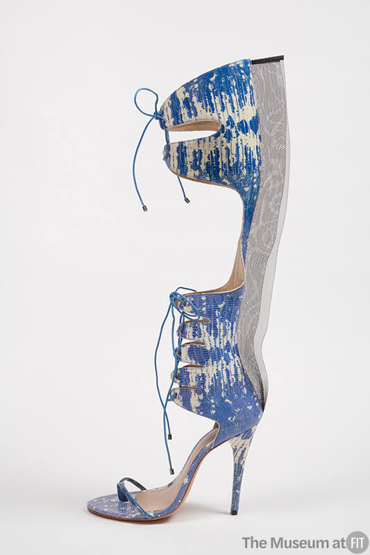 Blue and white reptile pattern gladiator style high heel boot with sandal style shoe, lace up c…