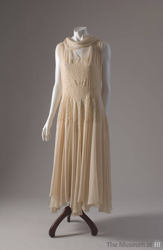 Ivory calf length sleeveless evening dress with pintucked rose design on bodice, self tie drape…