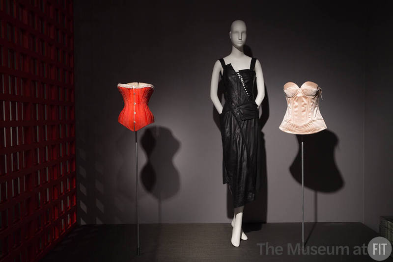 Power_Mode_12 Left to right 98.29.3 (corset), 2001.45.1 (dress), 2017.61.1 (corset)