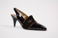 Black high heel sling back shoes with black suede mask acroos front with gold trim 
