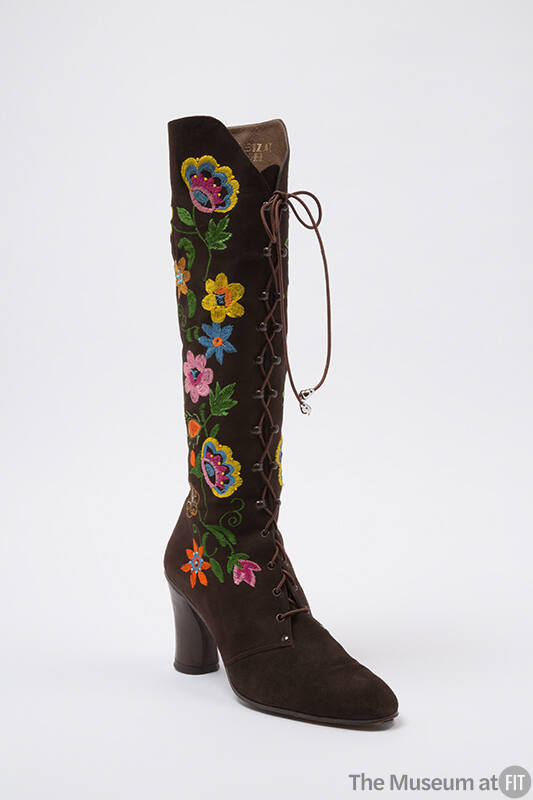 Brown knee high lace up boot with floral embroidery