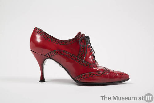 Red leather laceup shoes with spike heel