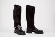 Black leather knee high boots with fur shaft and chunky soles