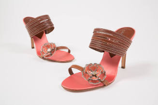 Pink satin high heel mules with tan leather straps and heel; pink metal flower with rhinestone …