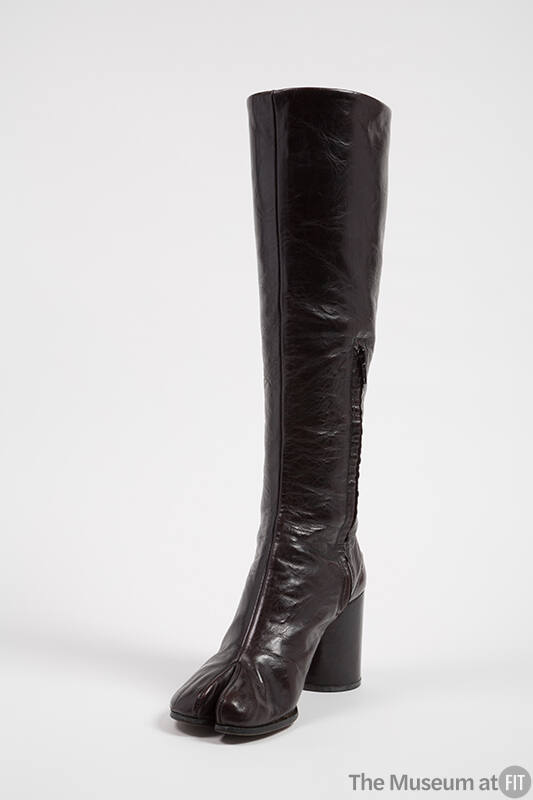 Brown leather knee high boot with round toe with cleft, high heel