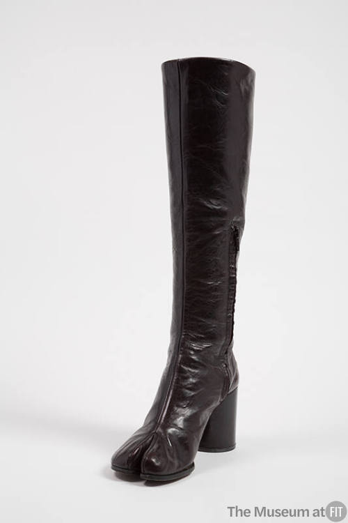 Brown leather knee high boot with round toe with cleft, high heel
