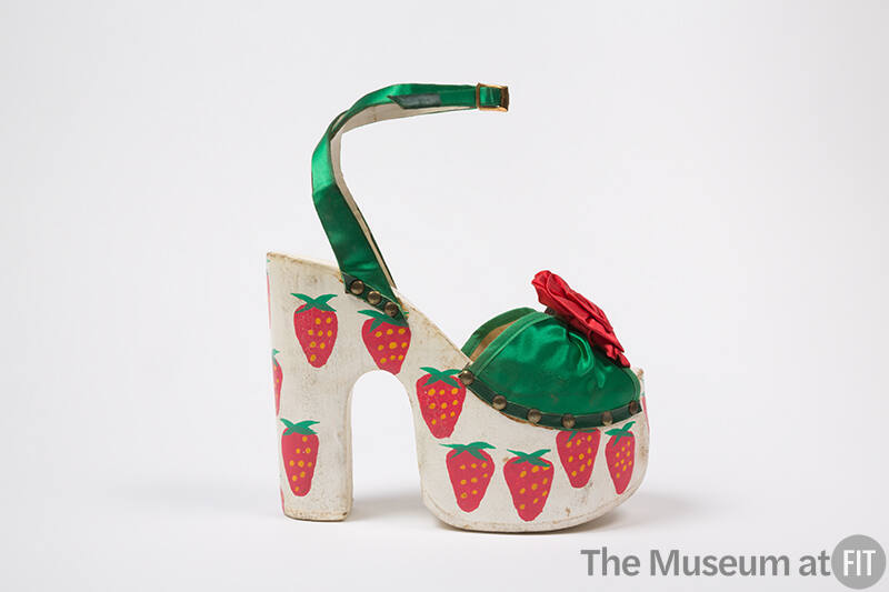 Green satin ankle strap open toe sandal with high white platform with painted strawberries 