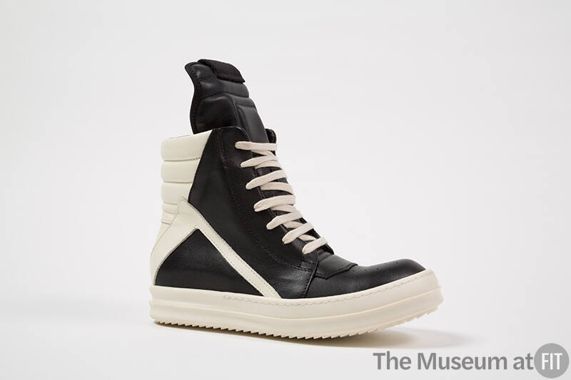 Black high top sneaker with off-white laces, heel and rubber sole