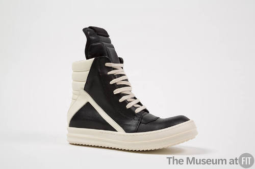 Black high top sneaker with off-white laces, heel and rubber sole
