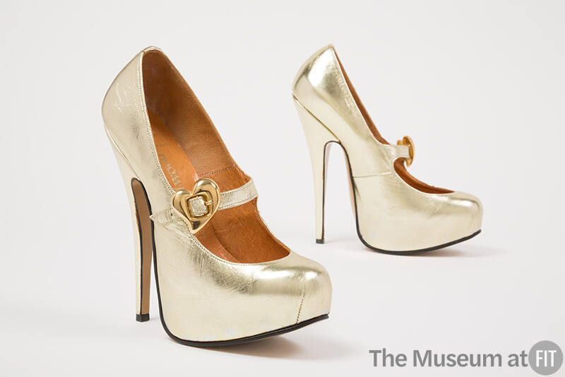 Metallic gold stiletto heel platform pumps with gold metal heart buckle strap 