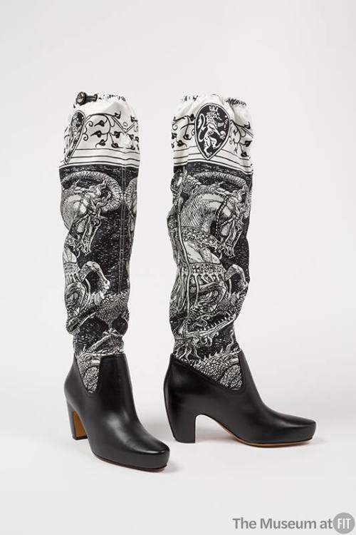 Black leather low heel boots with black and white printed silk above-the-knee uppers