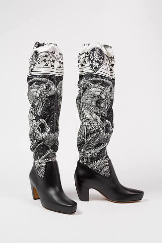 Black leather low heel boots with black and white printed silk above-the-knee uppers