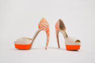 Beige open toe pumps, neon orange tiger print back, heels and front platform 