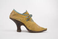 Yellow high heeled silk floral design shoe, blue trim, brown leather heel 