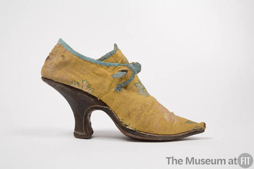 Yellow high heeled silk floral design shoe, blue trim, brown leather heel 