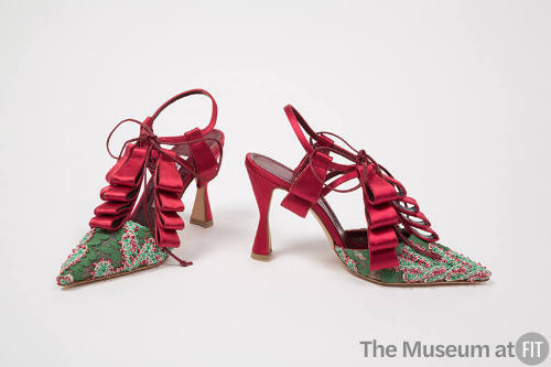 Red satin ankle strap high heel shoes with rows of ribbon loops, green lace pointed toe, sling …