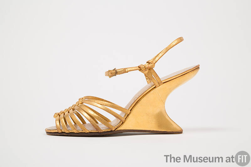 Gold leather ankle strap wedge heel sandal with thin vamp straps and open toe