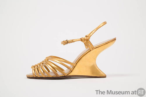 Gold leather ankle strap wedge heel sandal with thin vamp straps and open toe