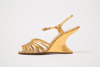 Gold leather ankle strap wedge heel sandal with thin vamp straps and open toe