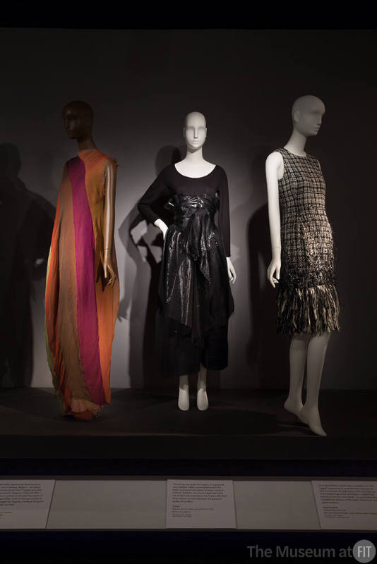 Unraveled_26 Left to right 96.39.2 (dress), 2010.44.1 (ensemble), 2017.67.1(tweed dress)