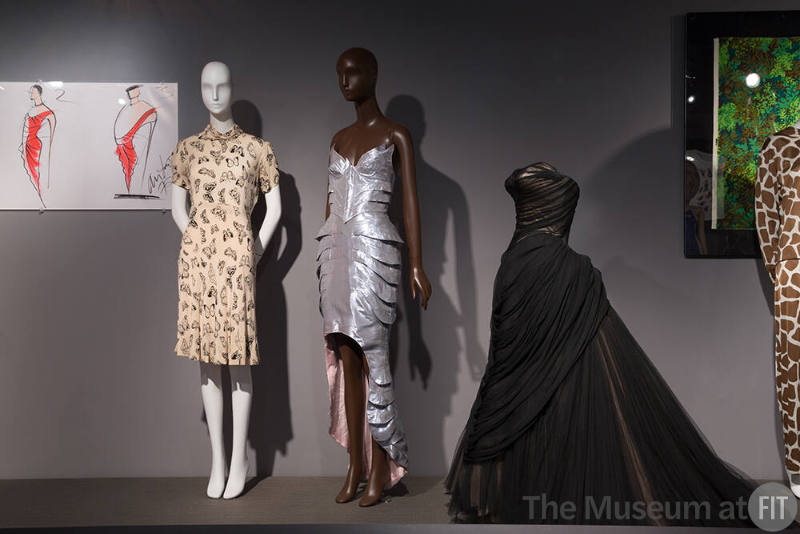 Nature_43 Left to right 83.130.10 (dress), 2011.13.1 (silver dress), 91.241.136 (gown)