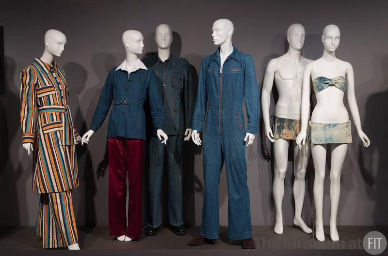 Denim_21 Left to right 81.24.24 (ensemble), 82.183.4 (jacket), 81.145.22 (shirt),  2015.65.27 (pants), 85.161.8 (suit), 2015.71.2 (jumpsuit), 78.100.1 (swimsuit), 78.100.2 (bikini) 