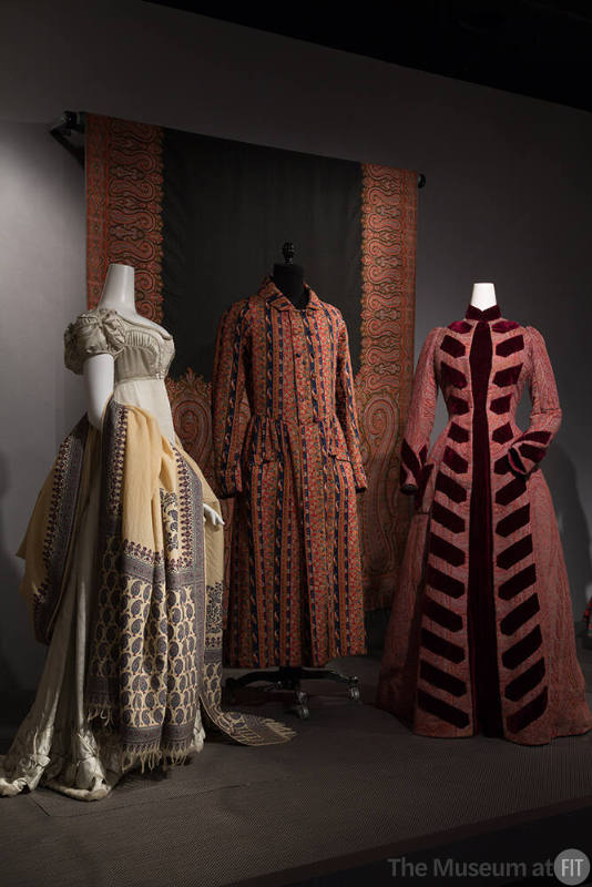 Trendology_03 Left to right P85.19.1 (dress), P86.71.2 (shawl), 76.208.7 (man's dressing gown), 89.154.12 (dress), 68.175.1 (shawl wall) 