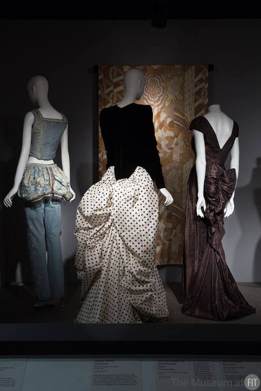 RetroSpective_05 Left to right 2000.50.1 (ensemble), 2005.48.8 (dress), 94.85.3 (textile wall), PL74.1.55 (evening dress) 