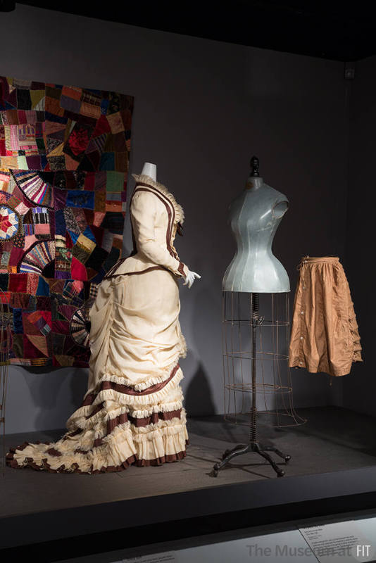 RetroSpective_36 Left to right 81.210.1 (quilt wall), P86.66.1 (dress), 76.86.38 (metal form), 2002.29.1 (bustle)