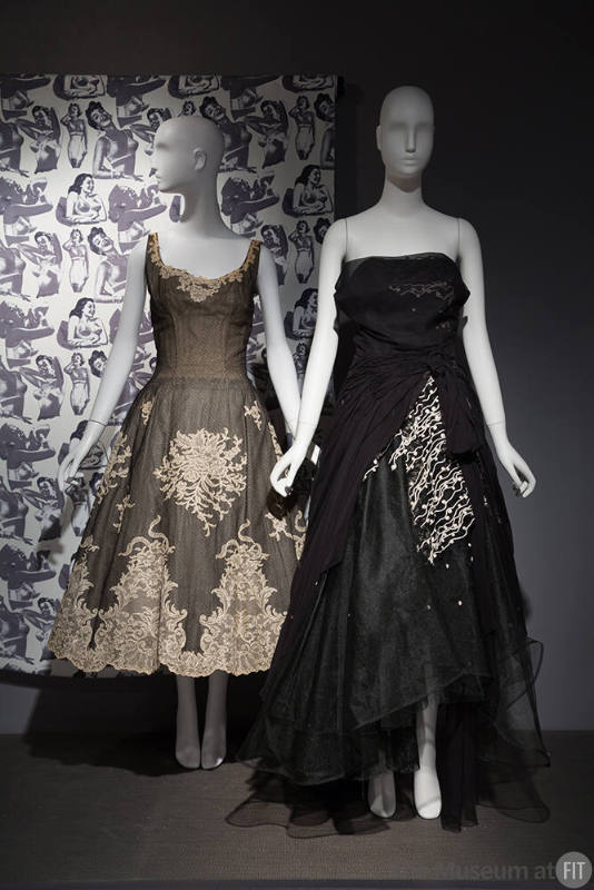 RetroSpective_46 Left to right P93.12.4 (textile wall), 72.109.1 (dress),  2010.89.1 (black dress)