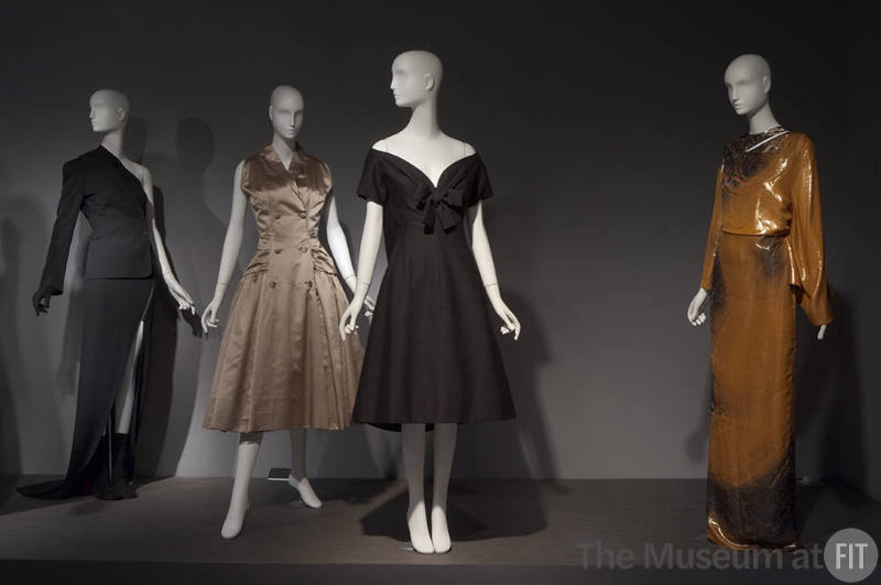 Fashion A-Z (II)_10 Left to right 97.71.1 (ensemble), 71.213.20 (satin dress), 71.213.30 (dress), 2011.39.1 (metallic dress)