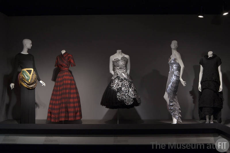 Fashion A-Z (I)_15 Left to right 82.55.2 (dress), 76.173.1 (striped dress), 2010.61.1 (dress), 2011.13.1 (metallic dress), 99.34.1 (dress)