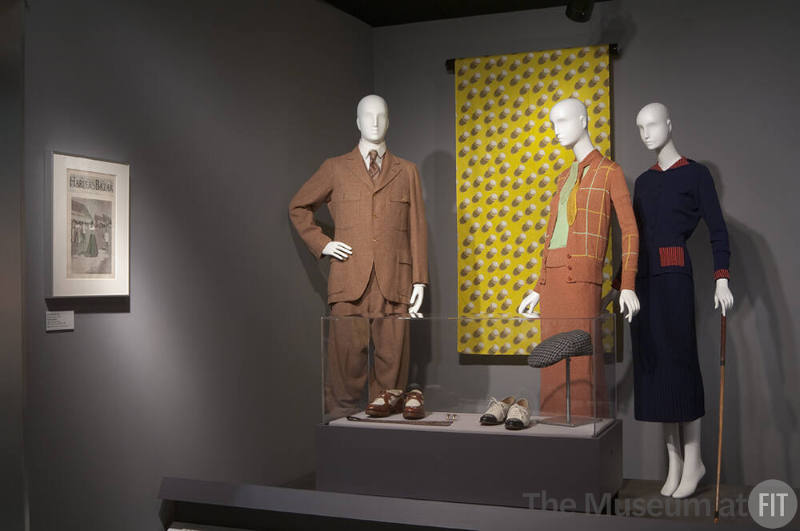 Sporting Life_19 Left to right P84.23.1 (suit), 2001.47.3 (textile wall), P91.86.2 (sweater ensemble), P90.25.6 (jacket and skirt), 71.255.38, 93.110.13, 89.17.150 (shoes and hat case) 