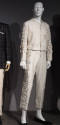 Man’s off-white evening suit of jacket with silver vine and leaf pattern embroidery, pearl and …