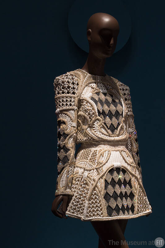 Black and white raffia with beige ground long sleeve evening mini dress multiple weave patterns…