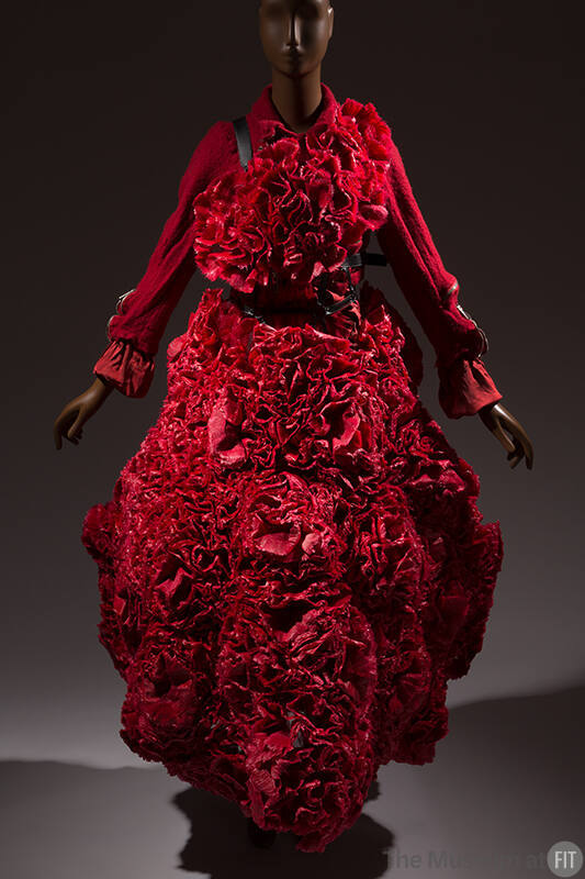 Red wool long sleeve jacket with satin cuffs, red floral bib with black straps, floor length re…