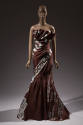 Brown and grey strapless dress with Chocolate Bar print, gathered bodice, floor-length with tru…
