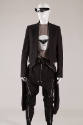 Black cropped blazer; grey t-shirt, black zip front  jumpsuit with large side zippers and front…