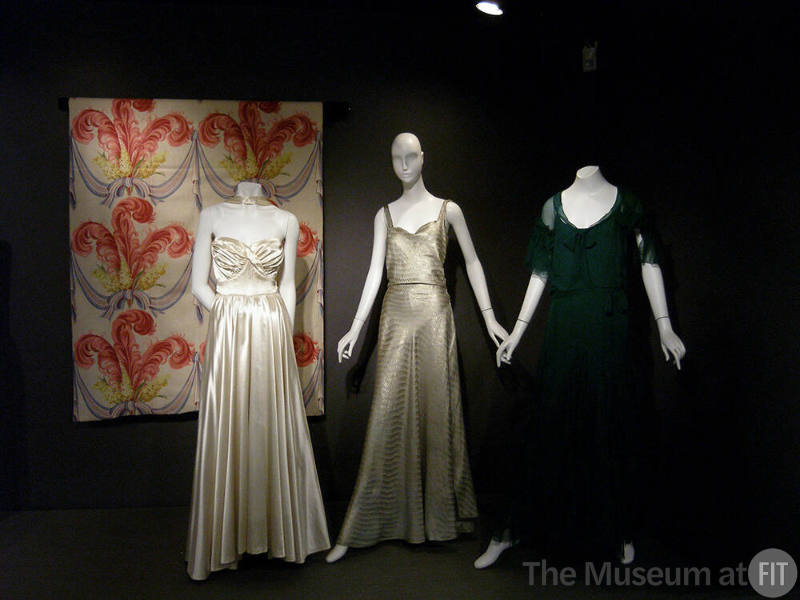 Rainbow_48 Left to right P88.3.1 (textile wall), 77.187.6 (white satin gown), 93.71.12 (silk dress), P86.66.5 (green dress)