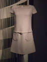 Light grey A-line mini dress, cap sleeves, belted drop waist, and round patch pockets