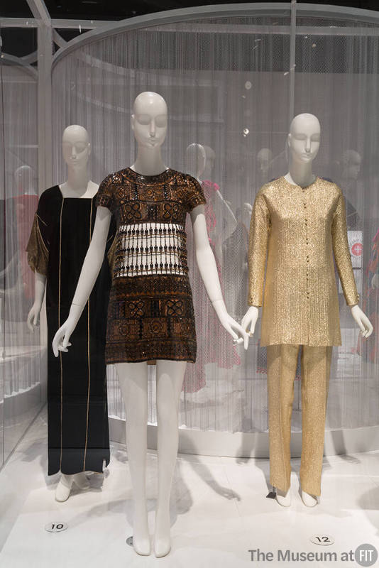 YSL+Halston_19 Left to right 88.81.1 (dress), P88.1.1 (beaded dress), 88.178.1 (gold pantsuit)