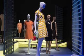 Paris Refashioned, 1957-1968 exhibition installation view of dressed mannequins on platforms